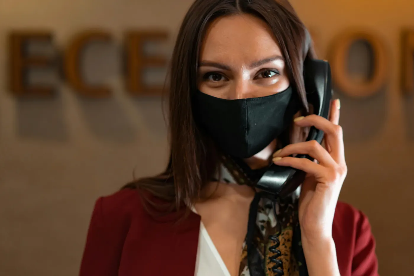 Receptionist managing appointment reminders by phone