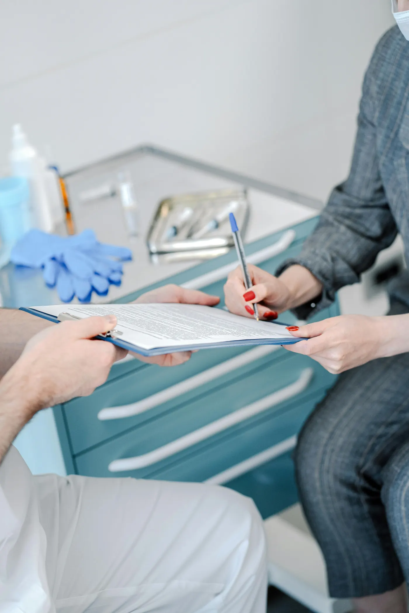 Patient completing arrival paperwork at a practice