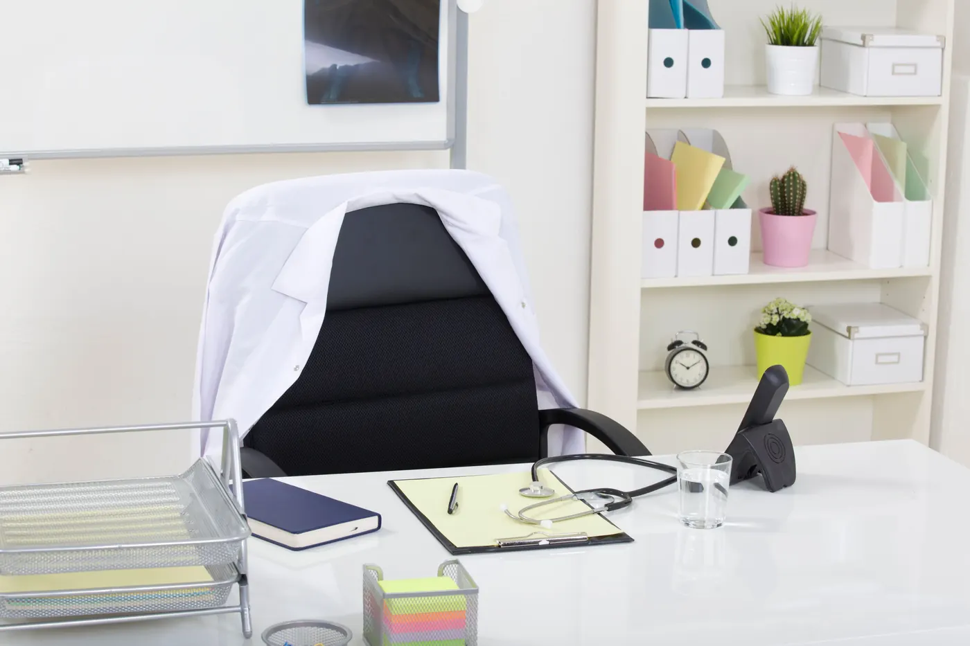 Practice desk with patient paperwork