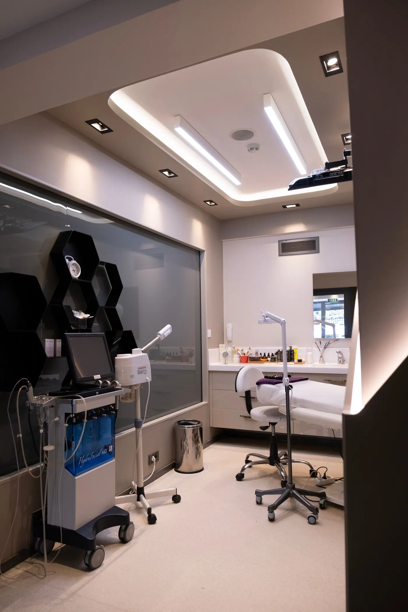 Specialist consultation room with warm clinical lighting